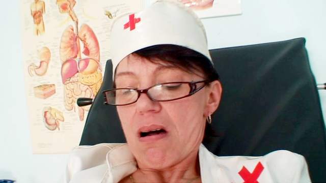Old nurse and her pink pussy up close