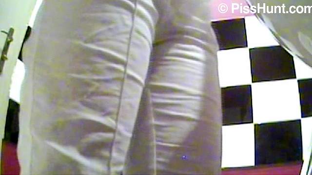 Spy camera captures bathroom pissing