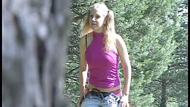 Blonde in pigtails goes piss outdoors