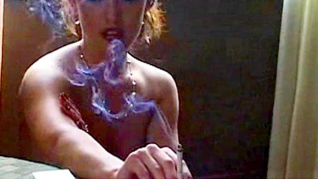 Topless girl smoking and looking hot