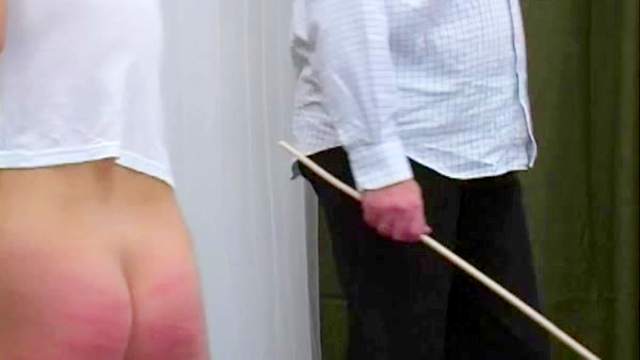 Ass caned hard by her dominant master