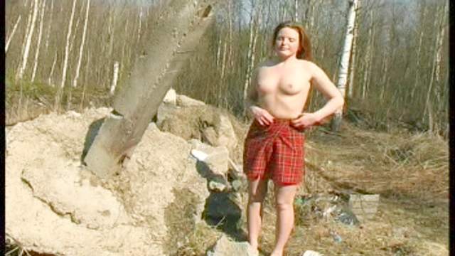 Pissing on a rock is a cute redhead