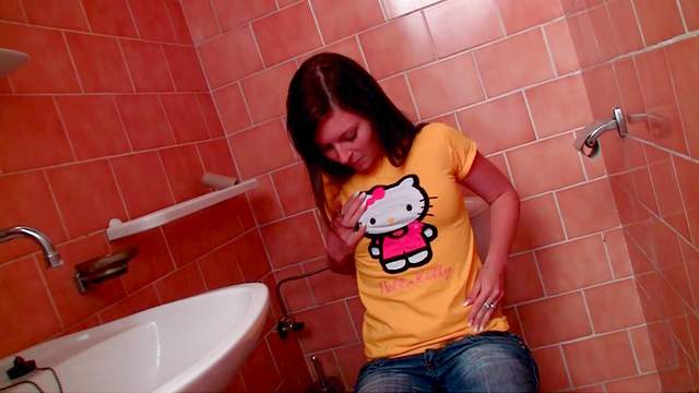 Teen in jeans masturbates in bathroom