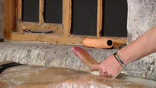 Handjob for bound boy in plastic wrap