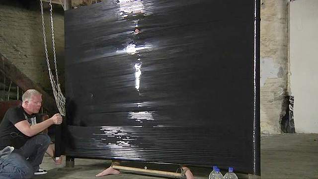 Gay daddy has fun with bondage submissive