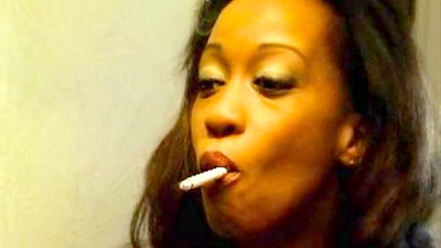 Smoking black girl with small natural tits