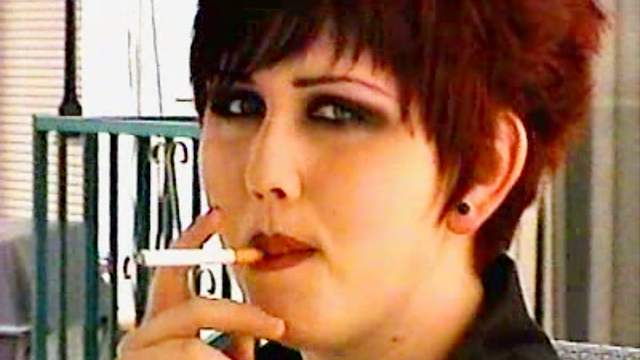 Goth girls smoking in fetish video