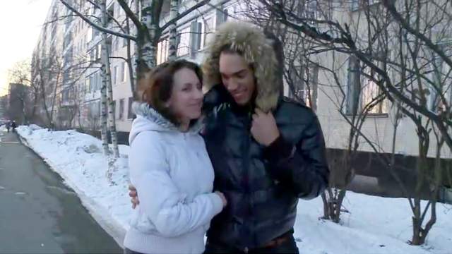 Olga is making nice interracial blowjob