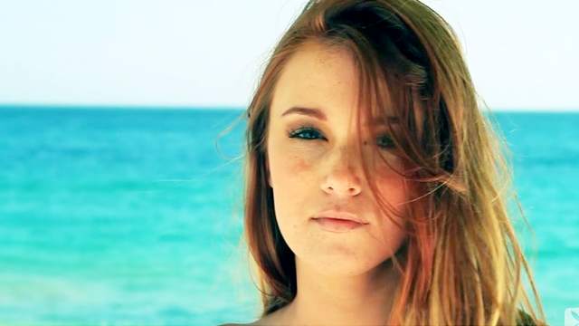 Redhead Leanna Decker at the ocean beach