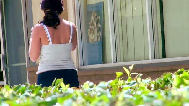 Sophie Dee shows off her booty in the public place
