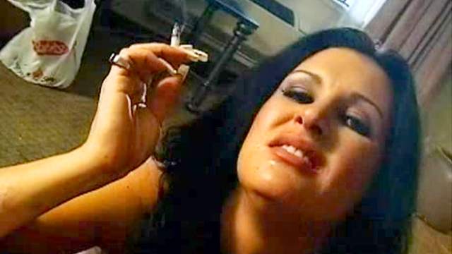 Brunette is smoking and sucking