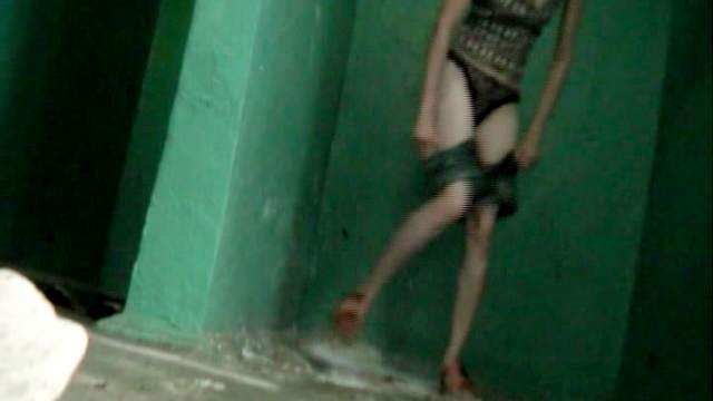 Amateur beauty is pissing in the abandoned building