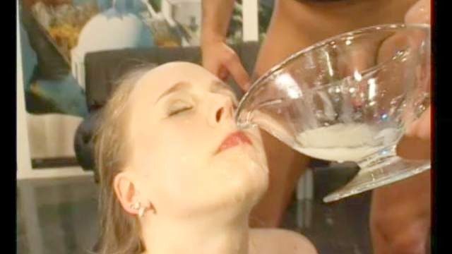 Nasty beauty is drinking tasty jizz from a plate