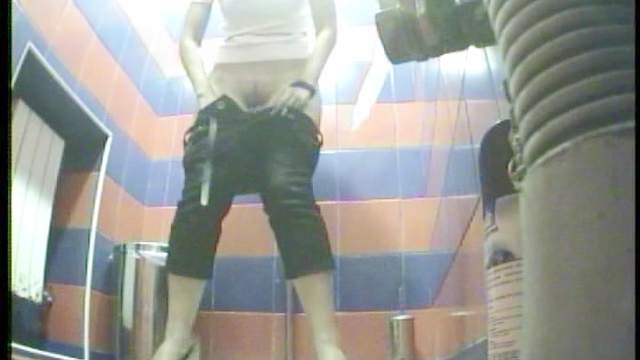 Innocent cutie with brunette hairs is so sad while peeing