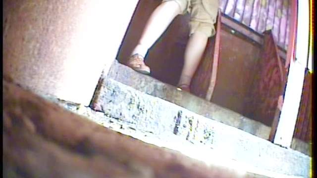 Perverted chubby woman is peeing in the public toilet