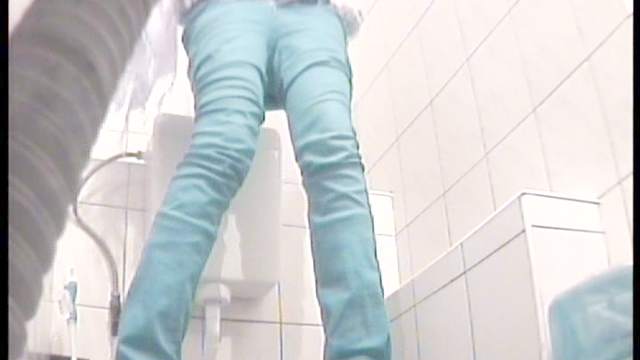 Slender blonde is getting pleasure during pissing