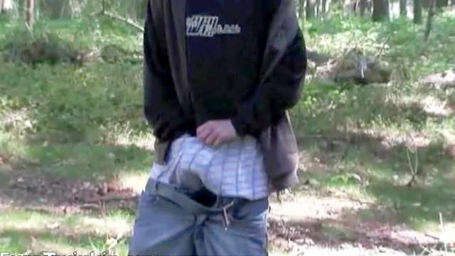 Innocent gay masturbates in the green forest