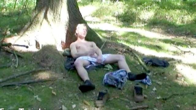 Innocent gay masturbates in the green forest