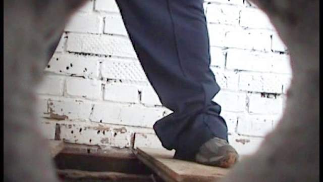 Skinny babe is peeing in the hole