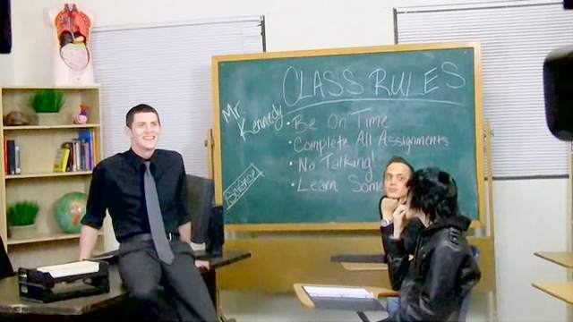 Sweet gay couple is having hardcore sex in the classroom