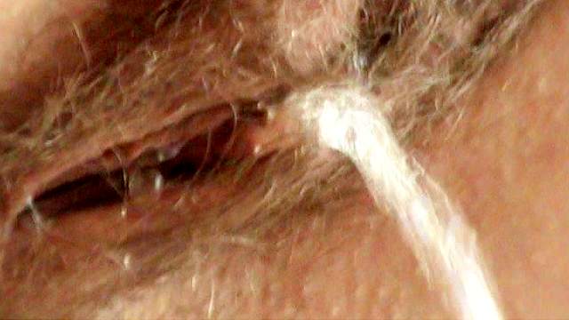 That hairy pussy is peeing in the toilet