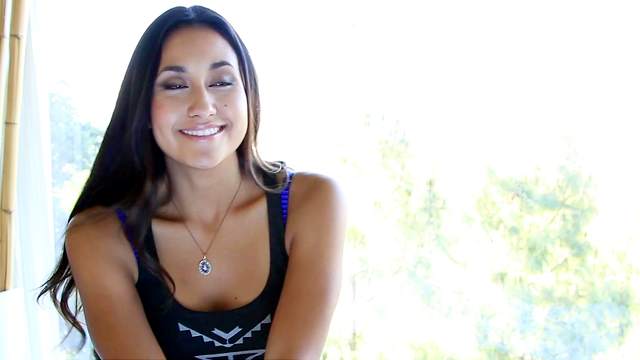 Sensual tanned babe Jeannie Santiago is getting naked on the video