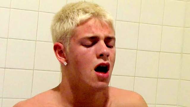 Blonde gay is masturbating his dick in HD scene